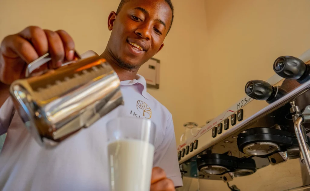 Barista making coffee at the espresso bar