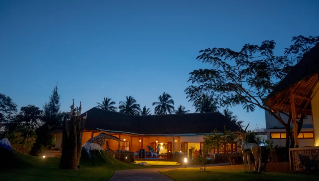 The main lodge lit up at blue hour